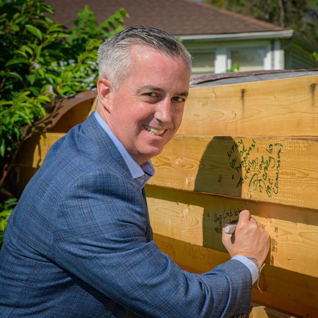 Persons signing house frame