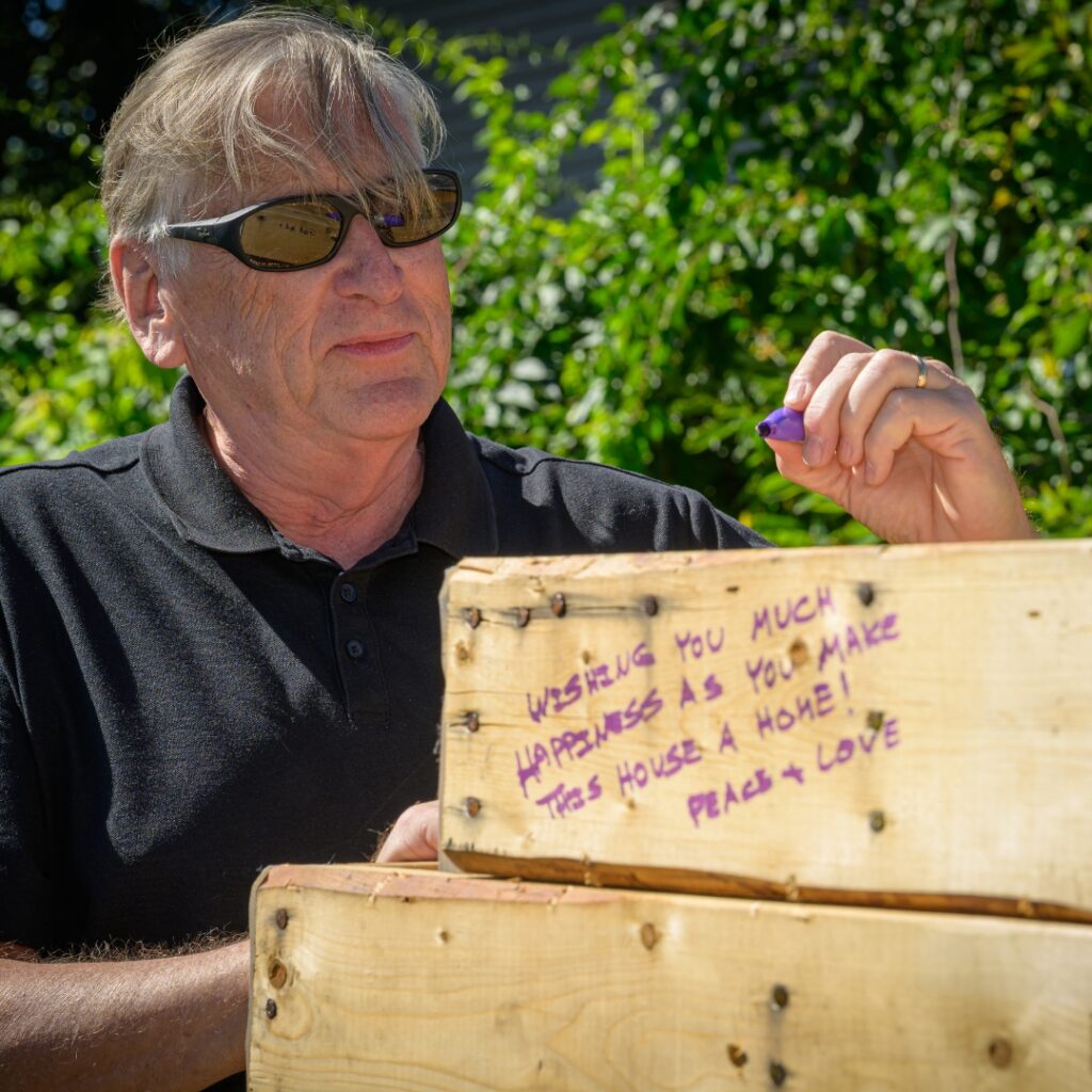 Persons signing house frame