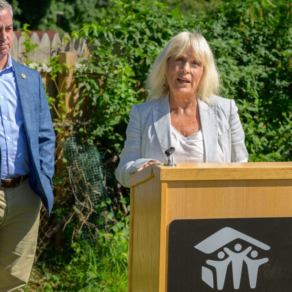 person speaking at podium