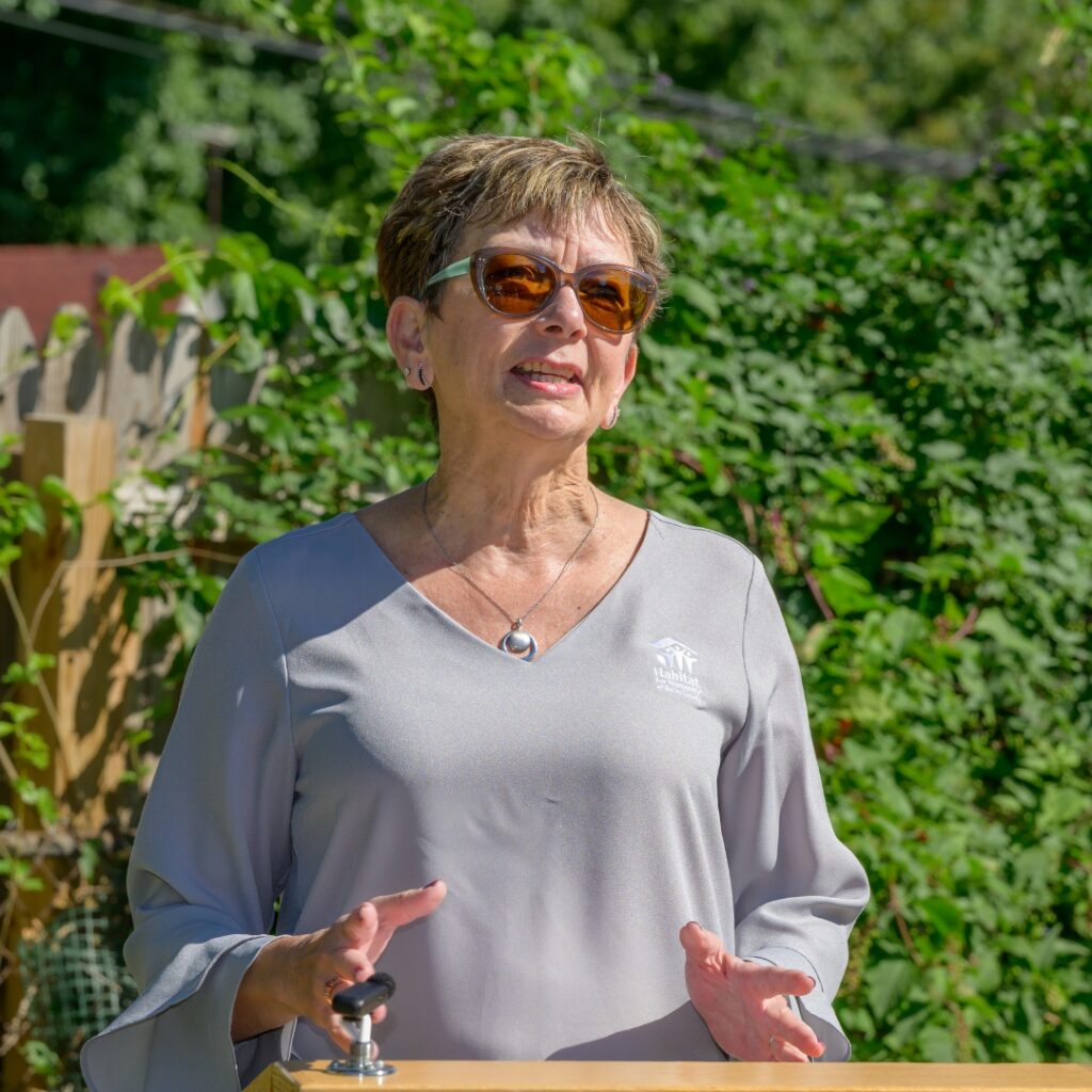person speaking at podium