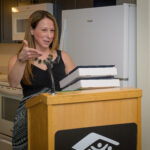person speaking at podium
